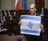 Polish MP Sparks Debate After Protest Using Israeli Flag with Nazi Symbol