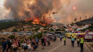 Wildfires Force Thousands to Flee as Blazes Sweep Across Europe